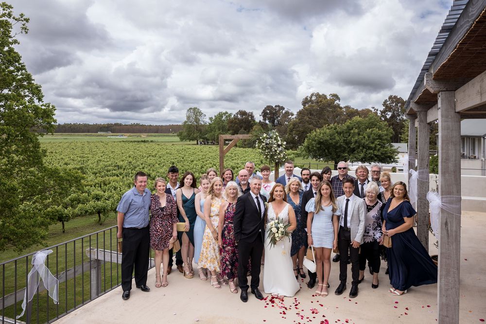 Bride and Groom with their guests during their ceremony at Lancemore Milawa captured by Jason Robins Photography