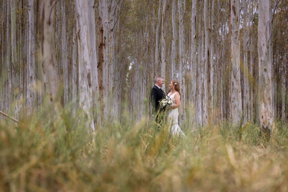 Bride and Groom on their bridal shoot in the trees at Brown Brothers Winery