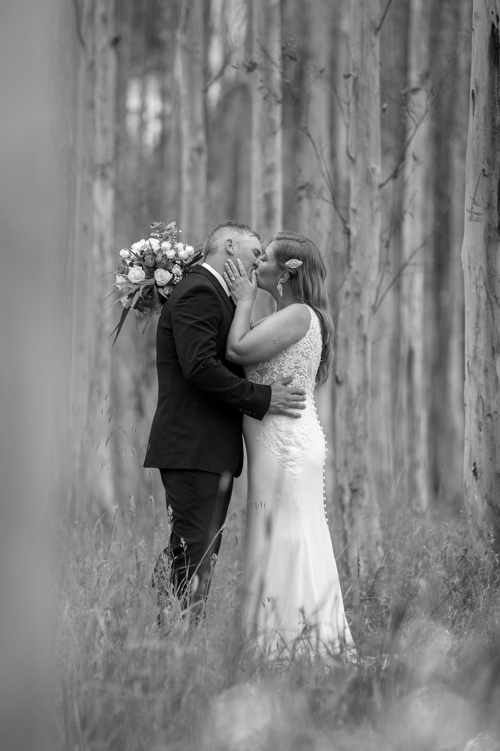 Bride and Groom on their bridal shoot in the trees at Brown Brothers Winery