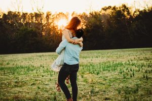 Romantic couple's photo shoot among the colorful flowers in New Haven, CT