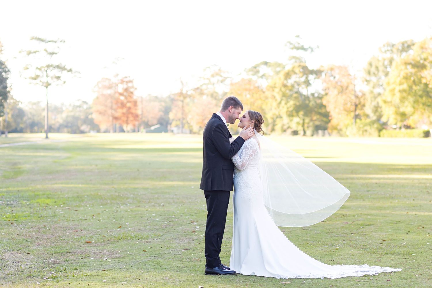 bride and groom nose to nose
