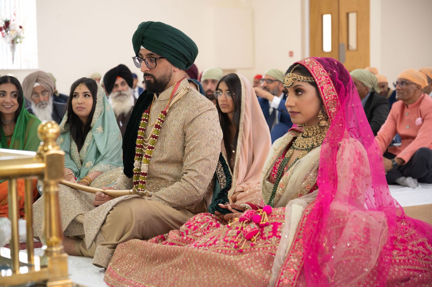 indian bride and groom at gurdwara