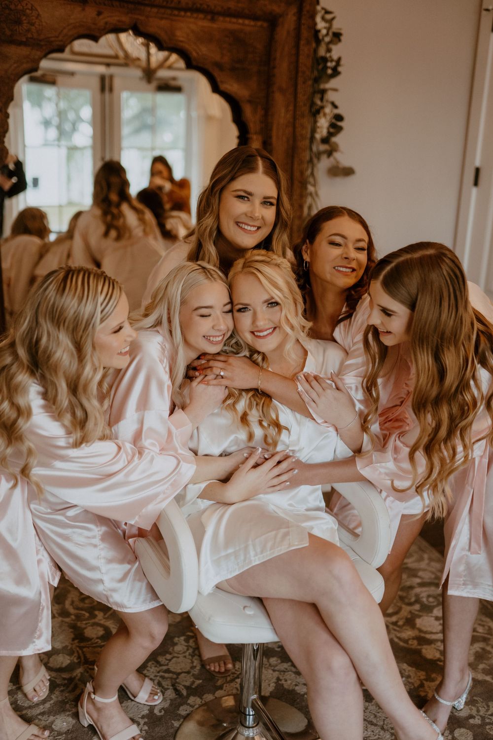 Ivory gown Lace details Long train Soft waves Floral crown Grey suit Blush tie