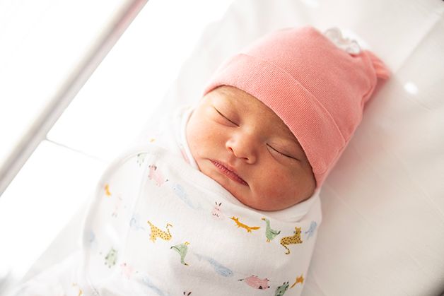 Newborn baby girl resting in bassinet by the window.  Hospital was Doctor's Hospital in Augusta, Georgia.
