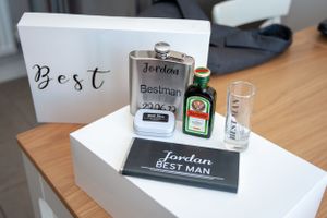 Best man gift box containing a hip flask, shot glass and Jagermeister bottle.