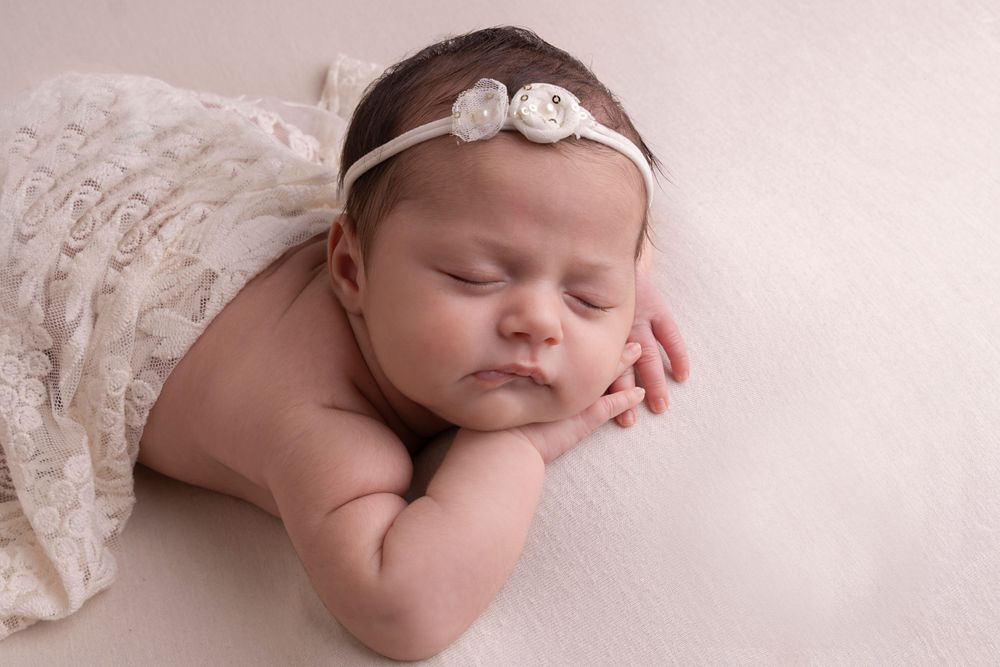 simple posed on baby's hand