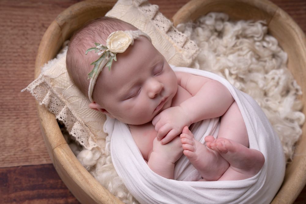 simple posed styled with a wrap in a womb pose