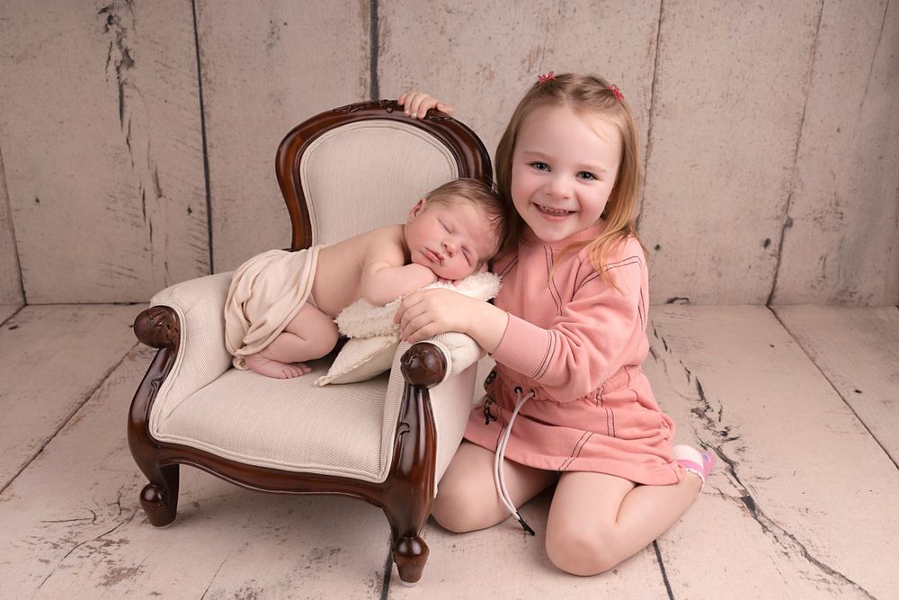 sibling love, simple safe newborn posing