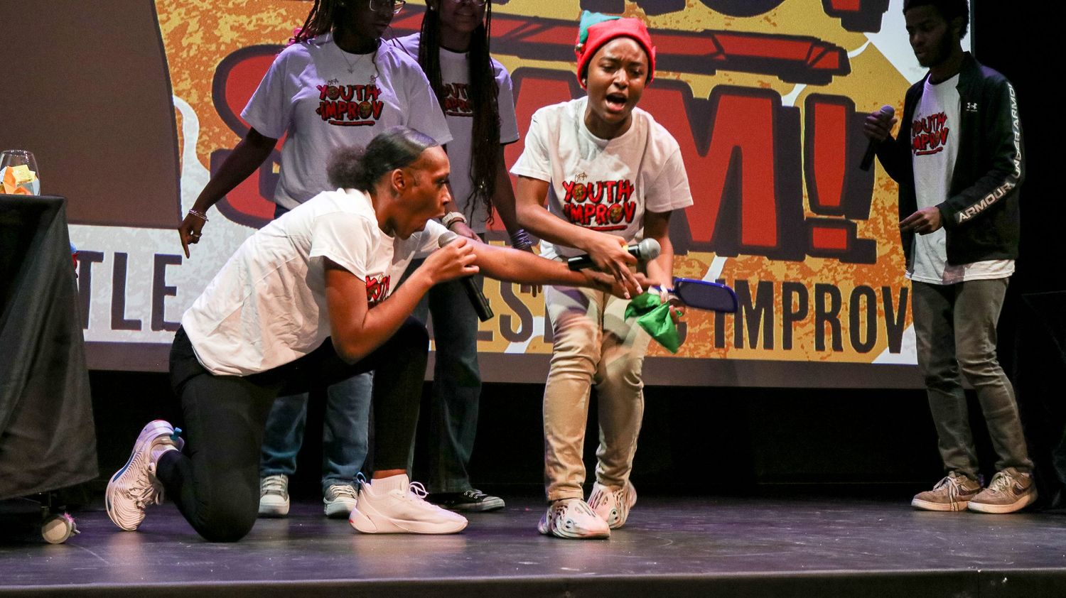 Performers on stage during the Canady Foundation for the Arts Youth Improv show.