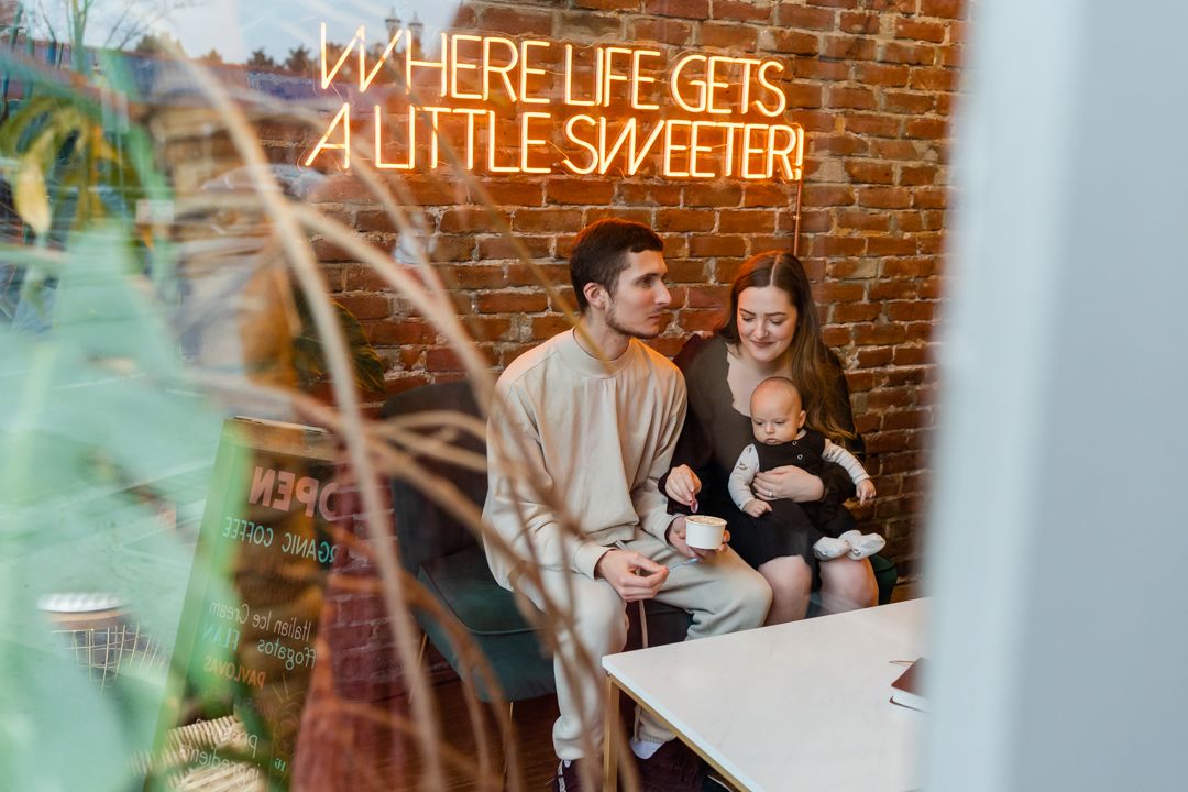 family enjoying gelato through the window
