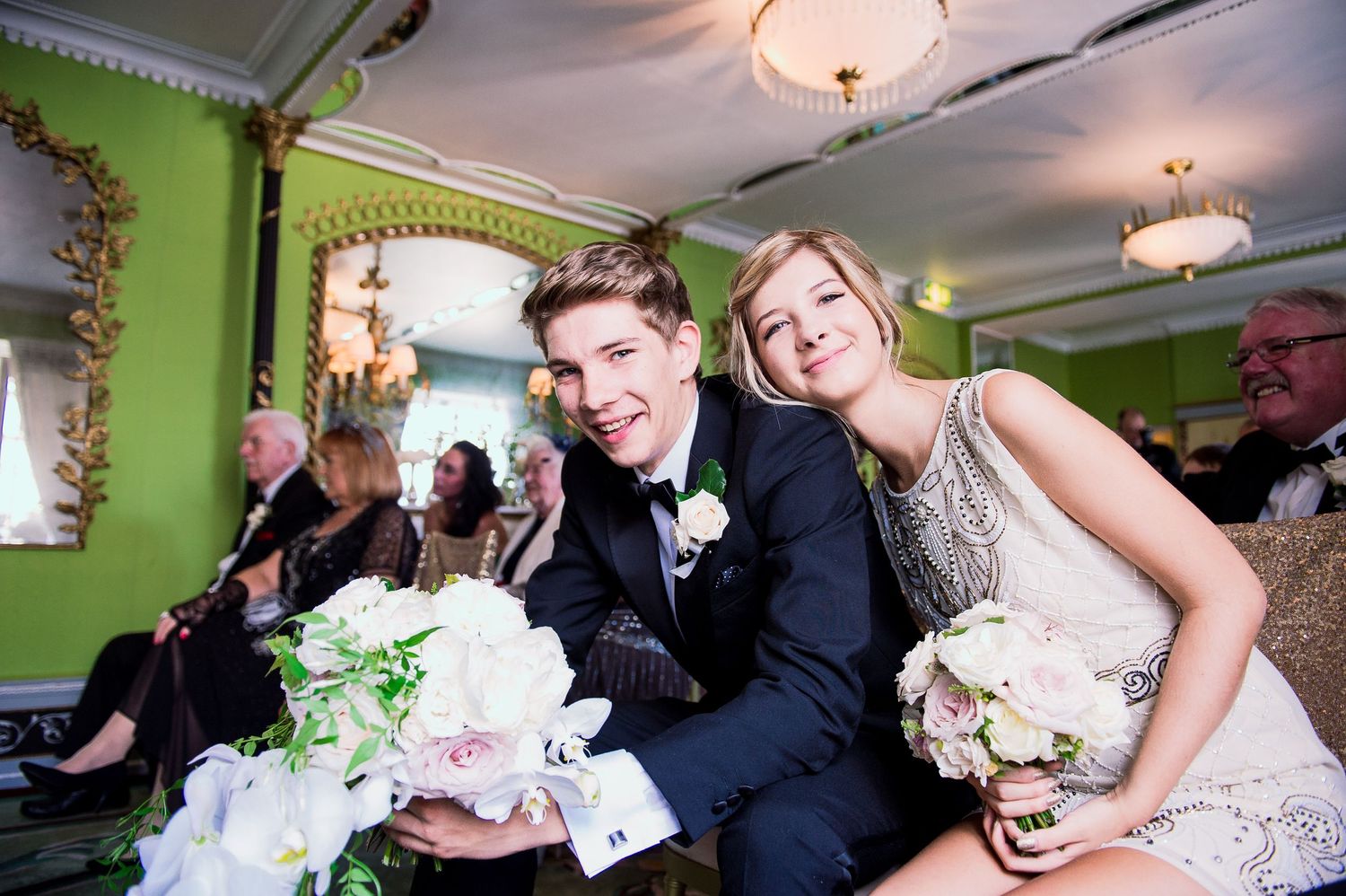 Happy wedding guests in the Dorchester Hotel