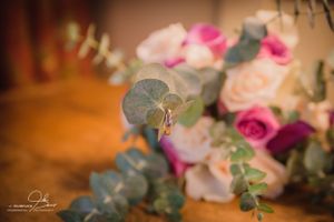 stylized shot of rings at wedding in Meredith NH