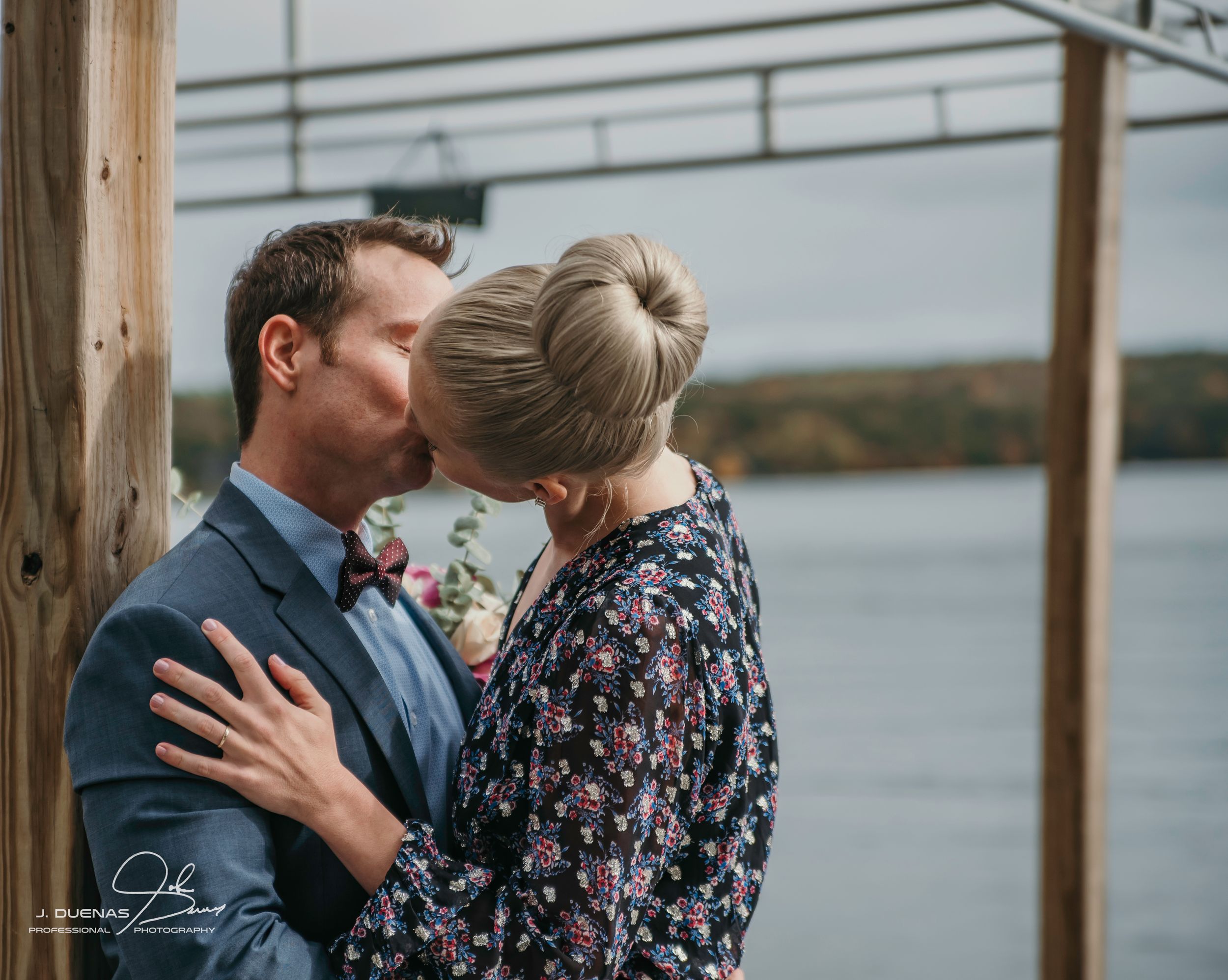 bride and groom on dock in Meredith NH