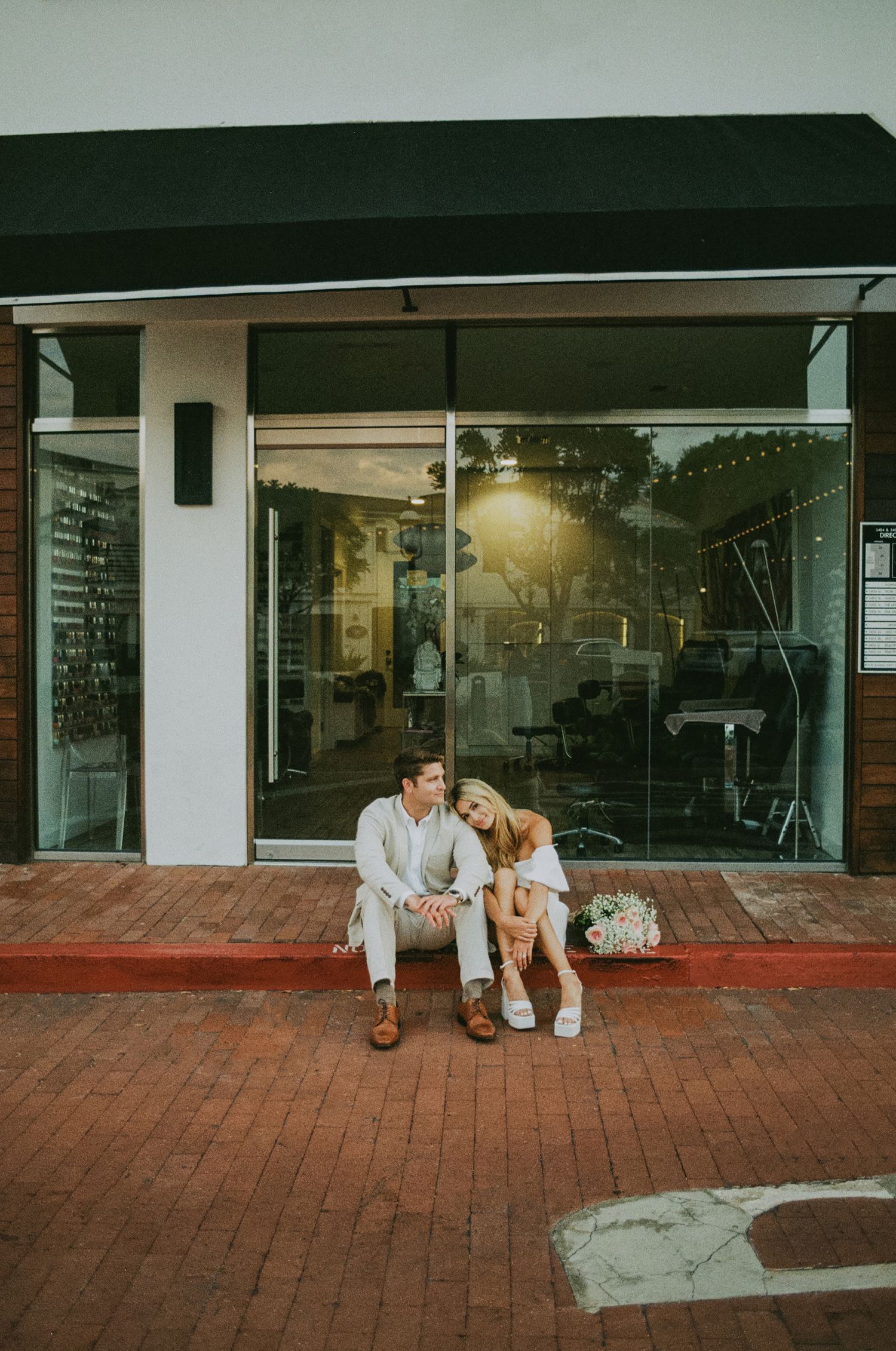 35mm film photo of fun bridal themed engagement shoot in Lido Marina, Newport beach