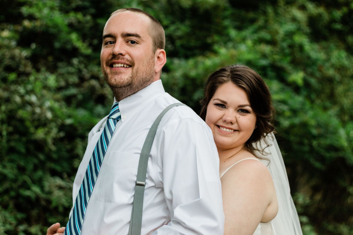 Bride hugging groom from behind first look elopement Marietta, GA