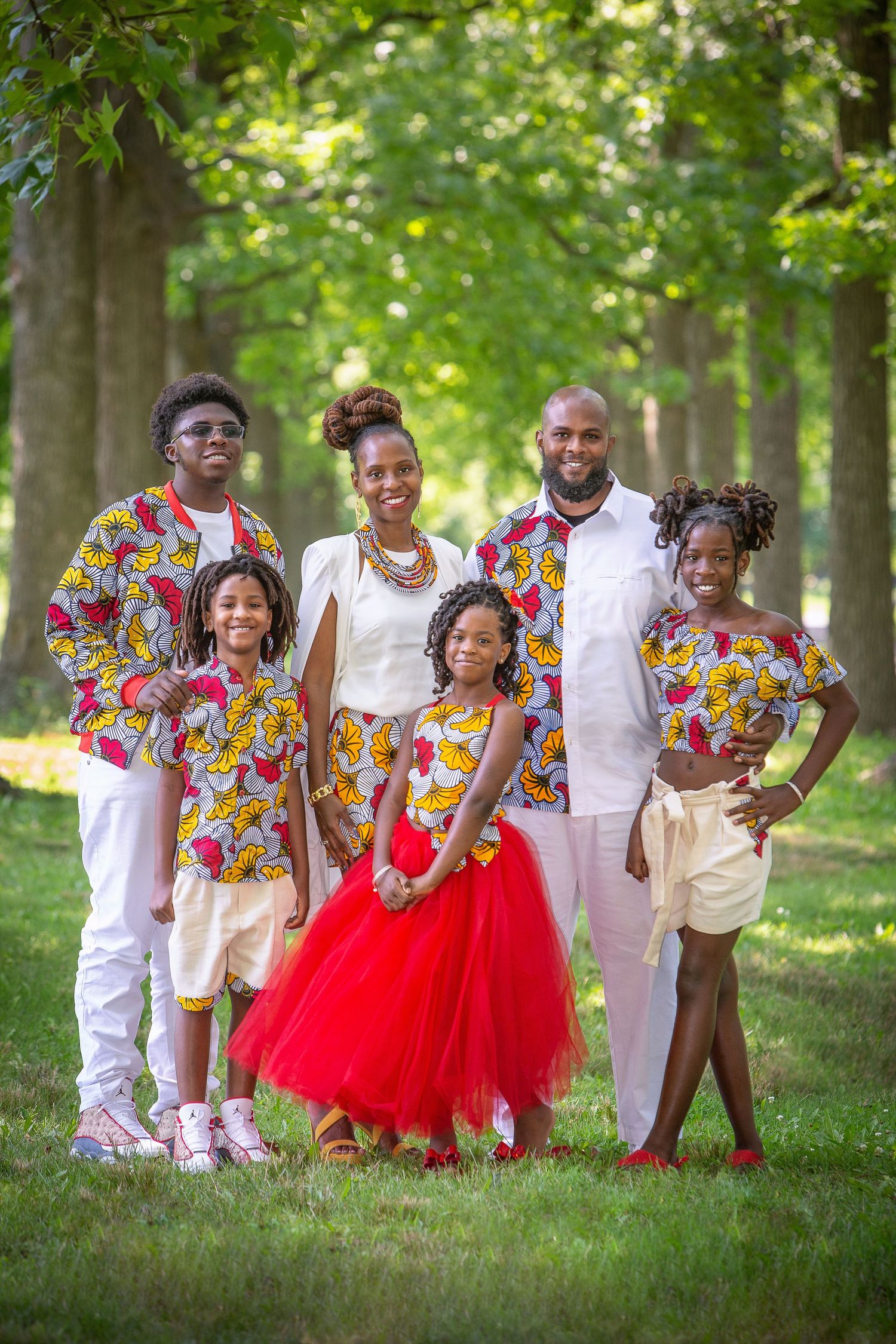 african family portraits in new jersey, in the style of red threads, 8k, pattern explosion, harmony with nature