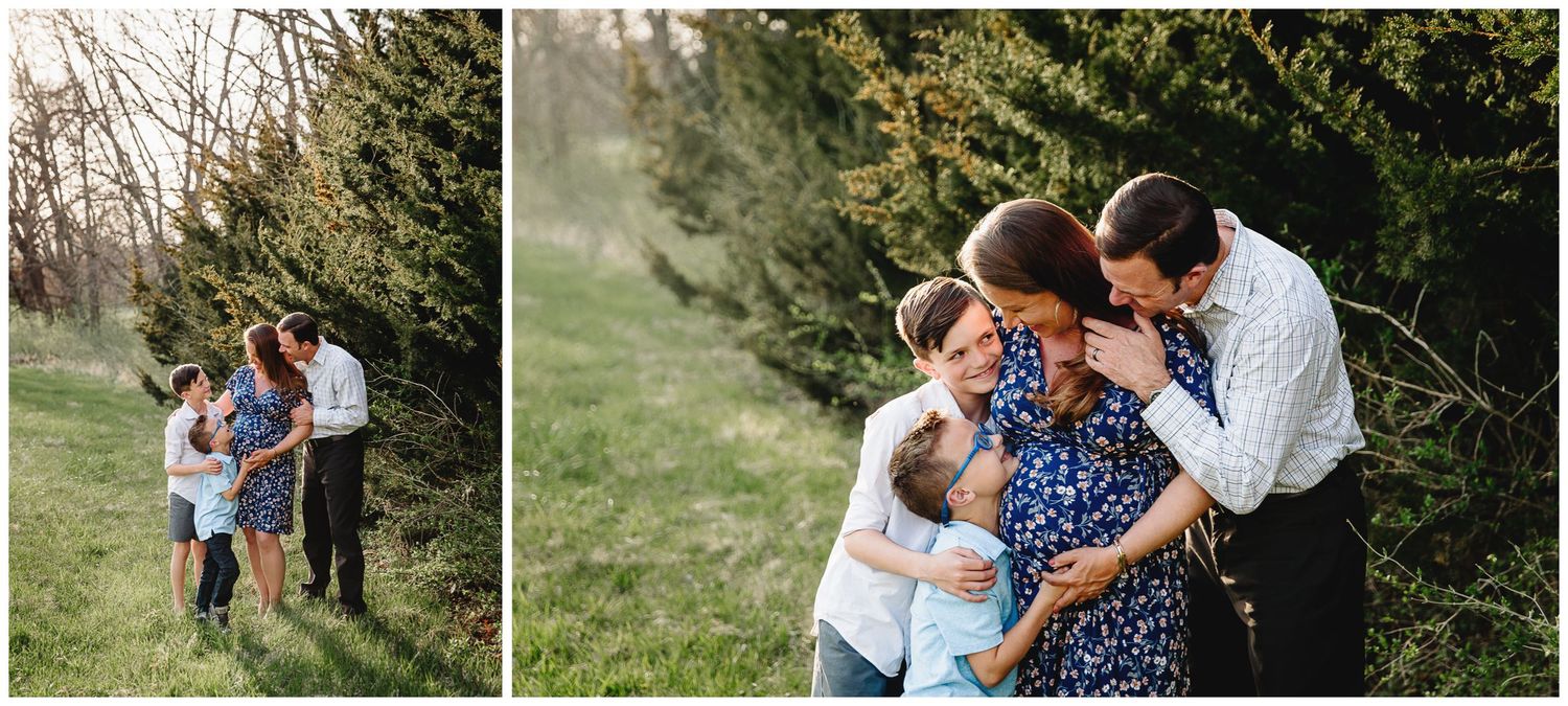 family embracing mom and her pregnant belly