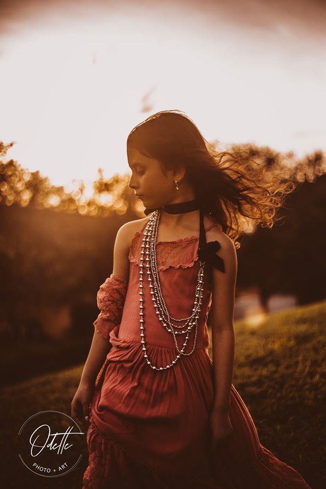 little girl in the sunset