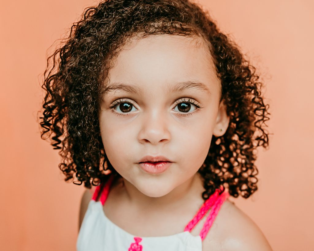 little girl looking at the camera