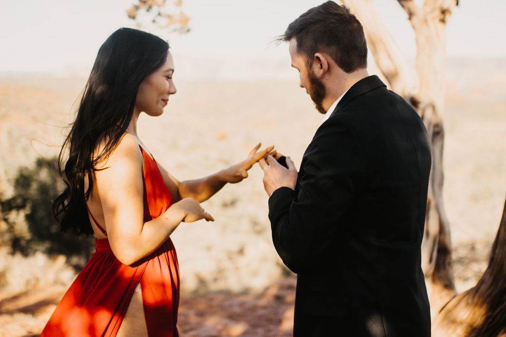 An emotional marriage proposal captured in a series of candid moments outdoors.