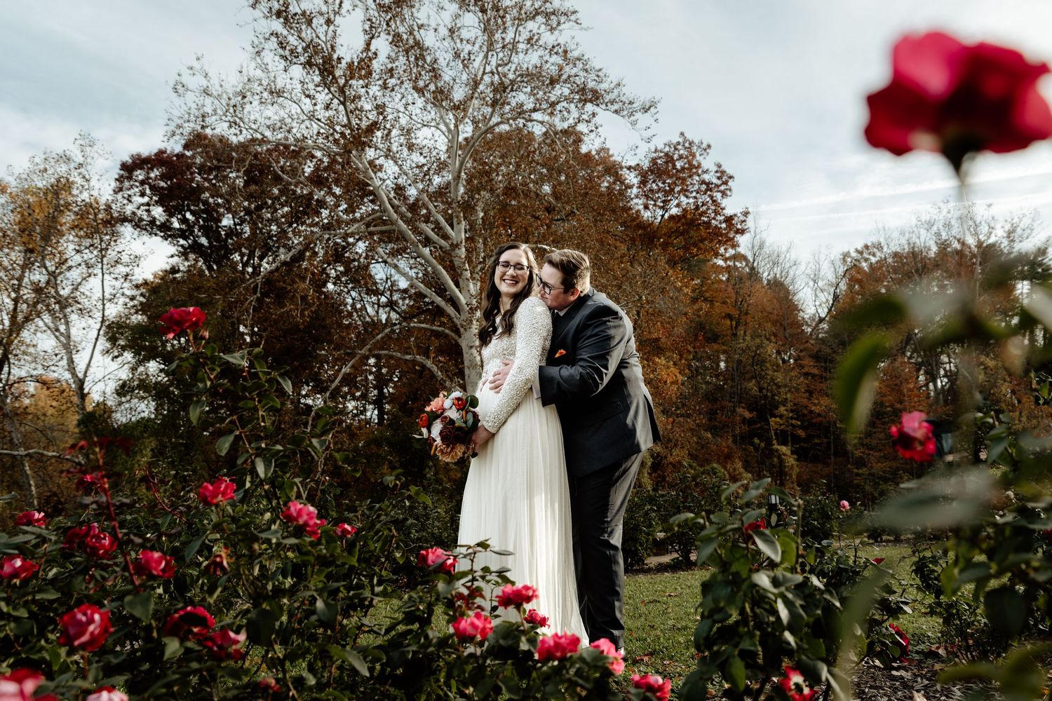Same sex LGBTQ+ lesbian couple celebrate their wedding at Ritter Park Rose Garden in Huntington, WV
