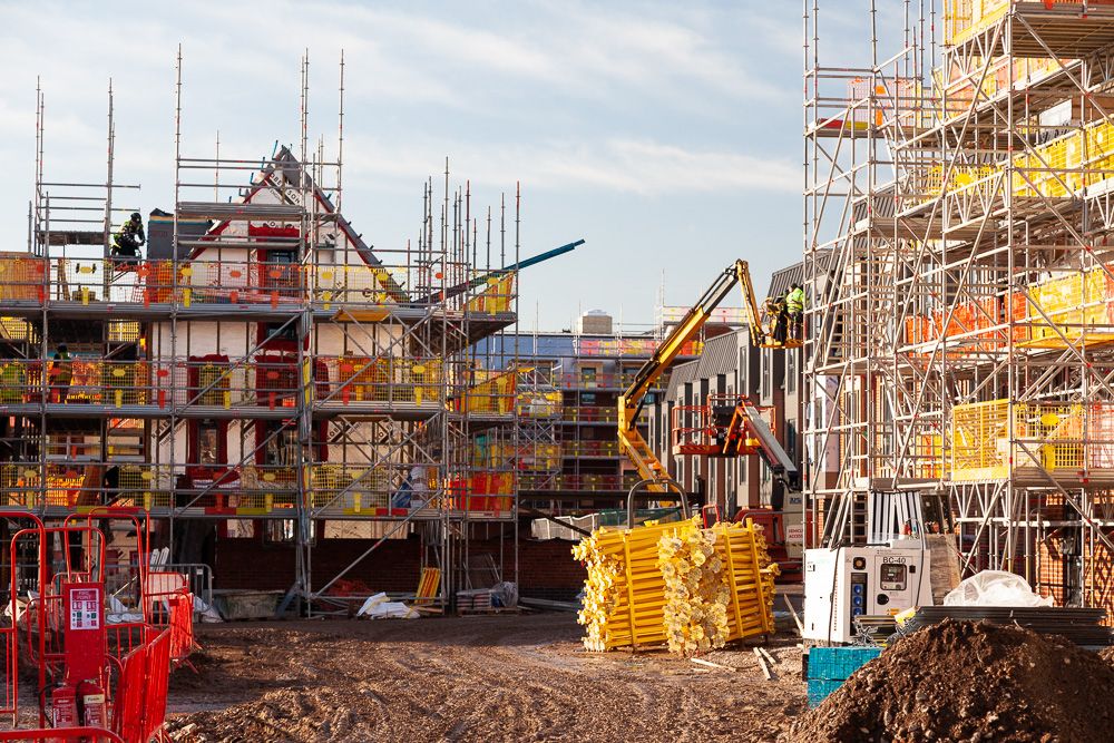 Construction photograph of timber frame housing construction site