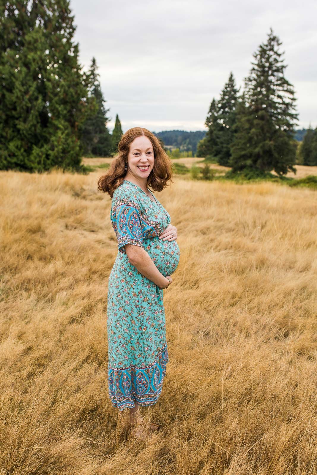 Maternity portrait of a redheaded mom