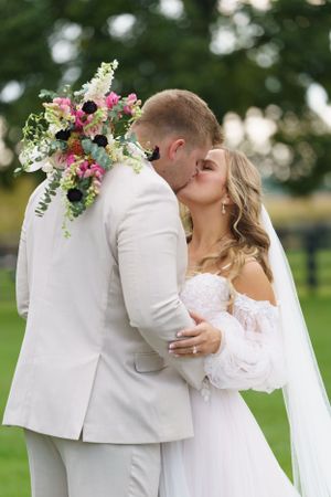 Bride and groom kiss