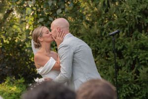 First Kiss during a ceremony at Wild Carrot in St. Louis, MO