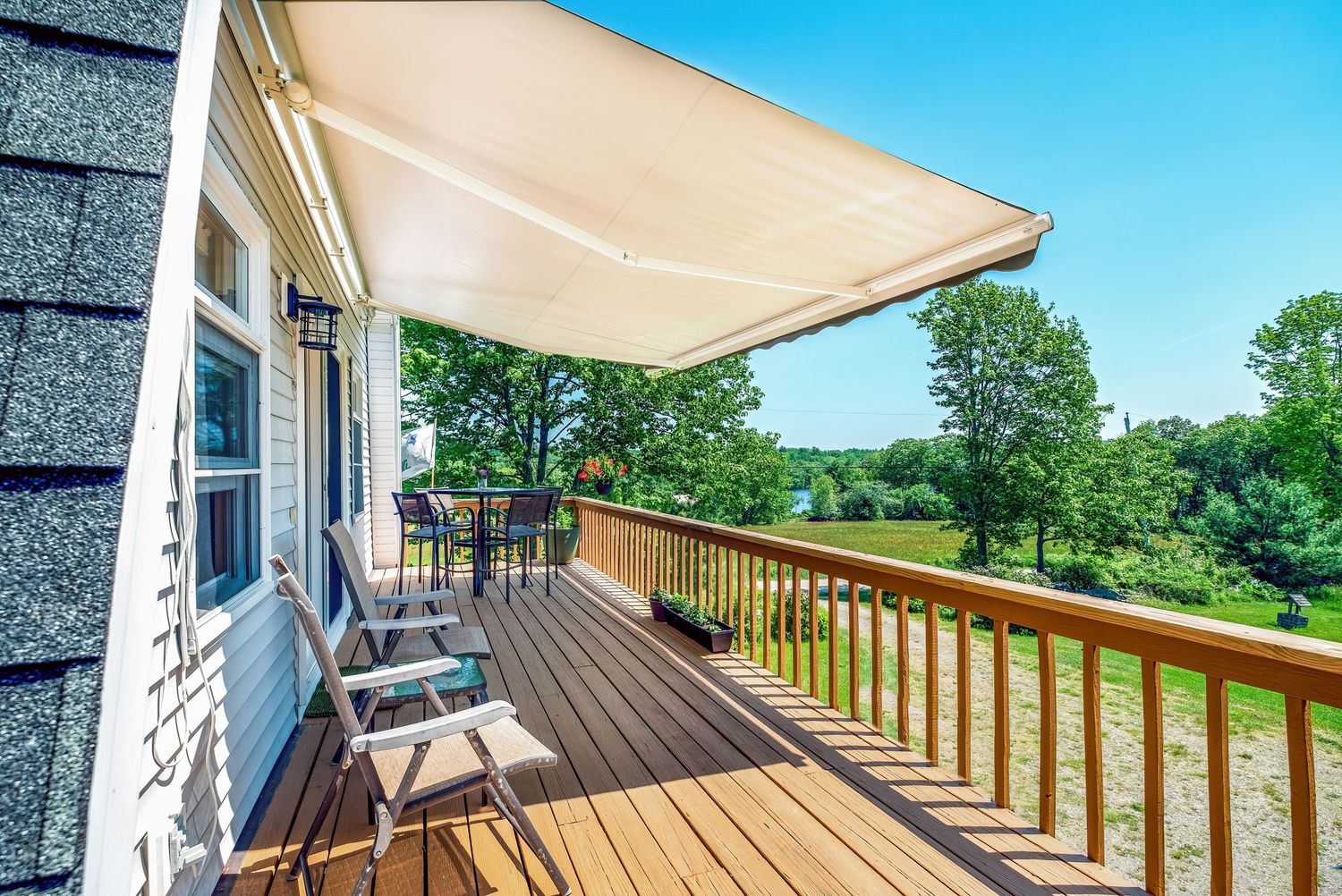 A shot of the deck overlooking a lake in Jefferson, Maine.