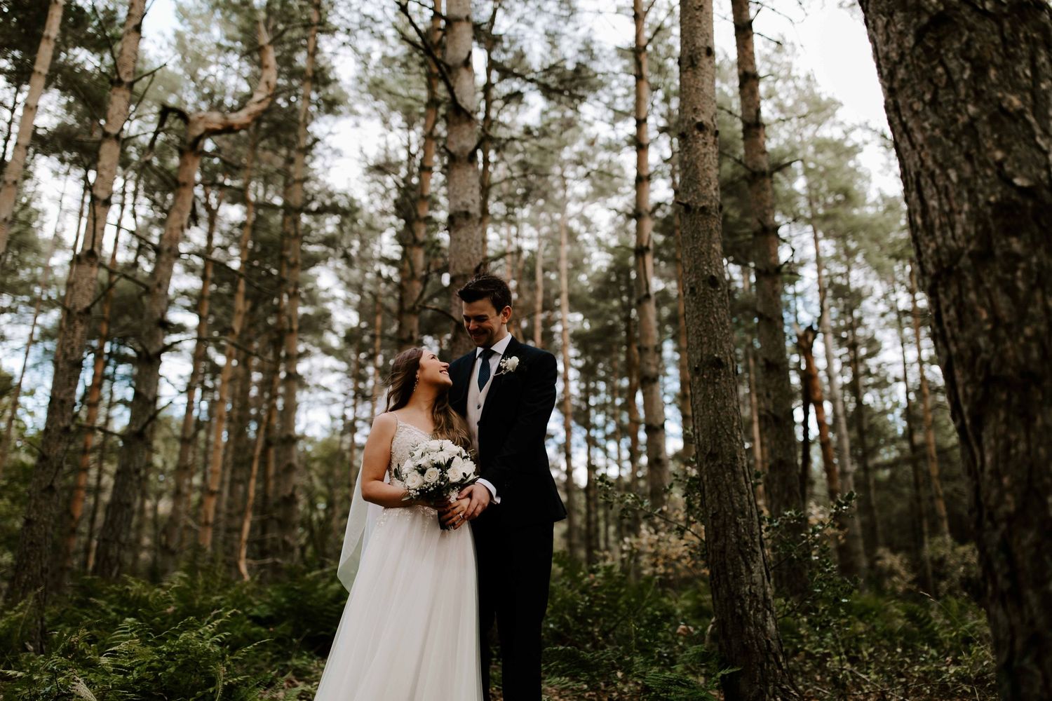 Healey Barn Wedding In Northumberland couples portrait in the woods