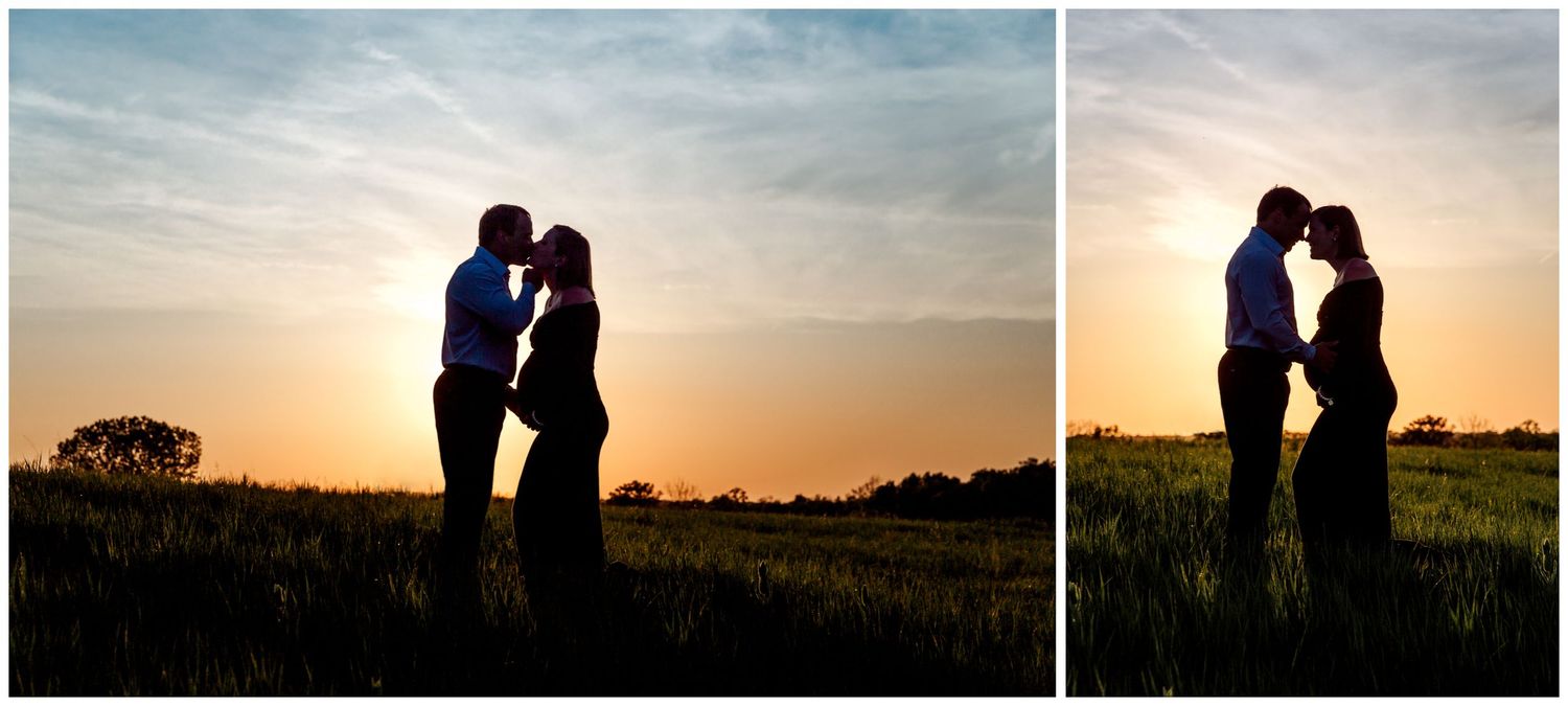 silhouette of man and expecting mother against the Kansas City sunset sky