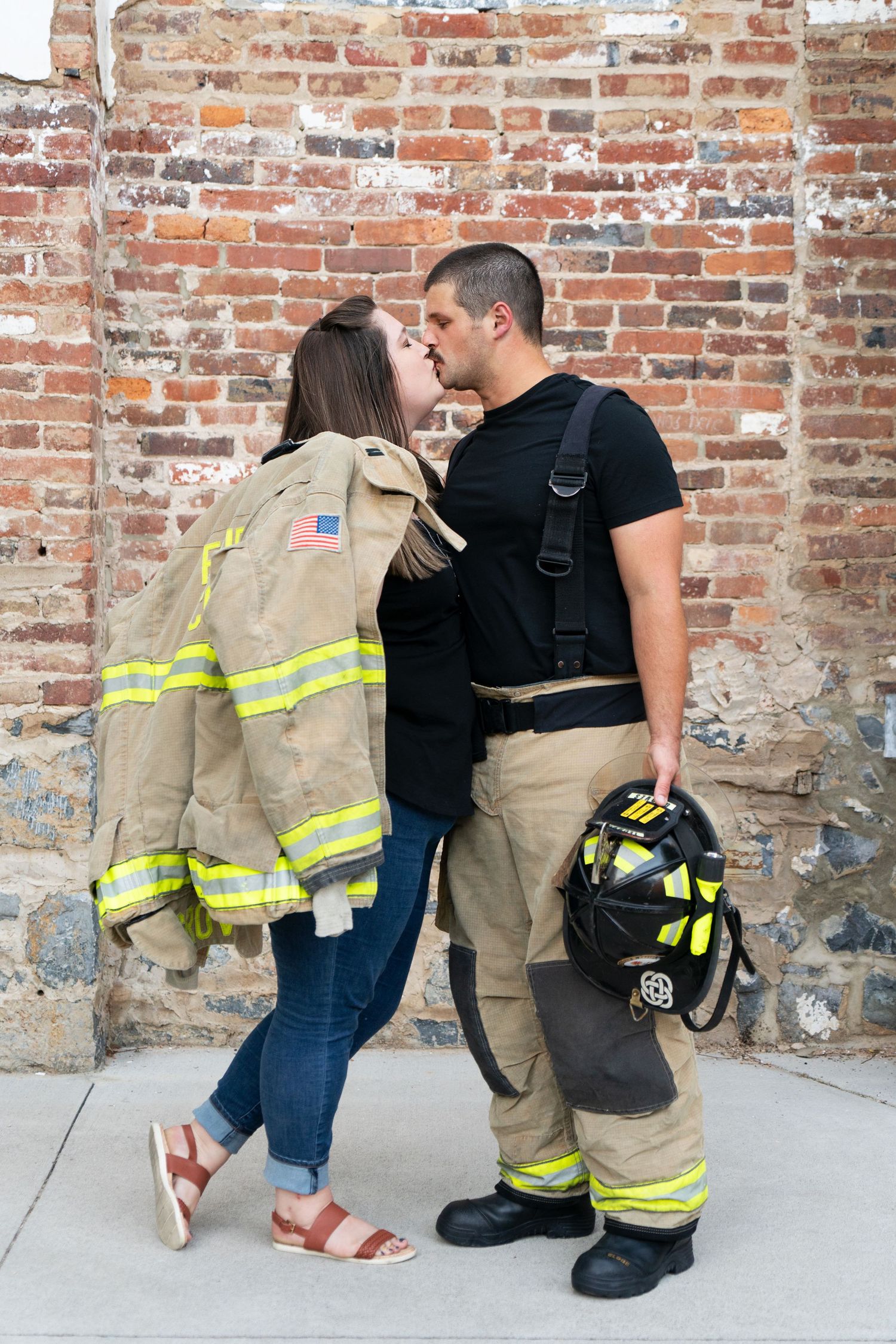 Firefighting couple share a smooch