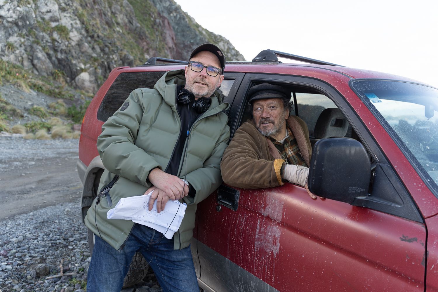 A behind the scenes image of director David Stubbs on set with actor Jim Moriarty