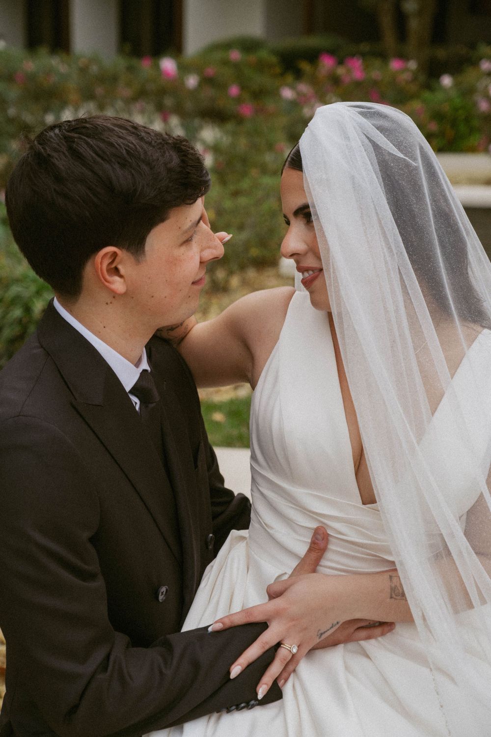 A romantic sequence of wedding photos showing a couple sharing tender moments in formal attire outdoors.