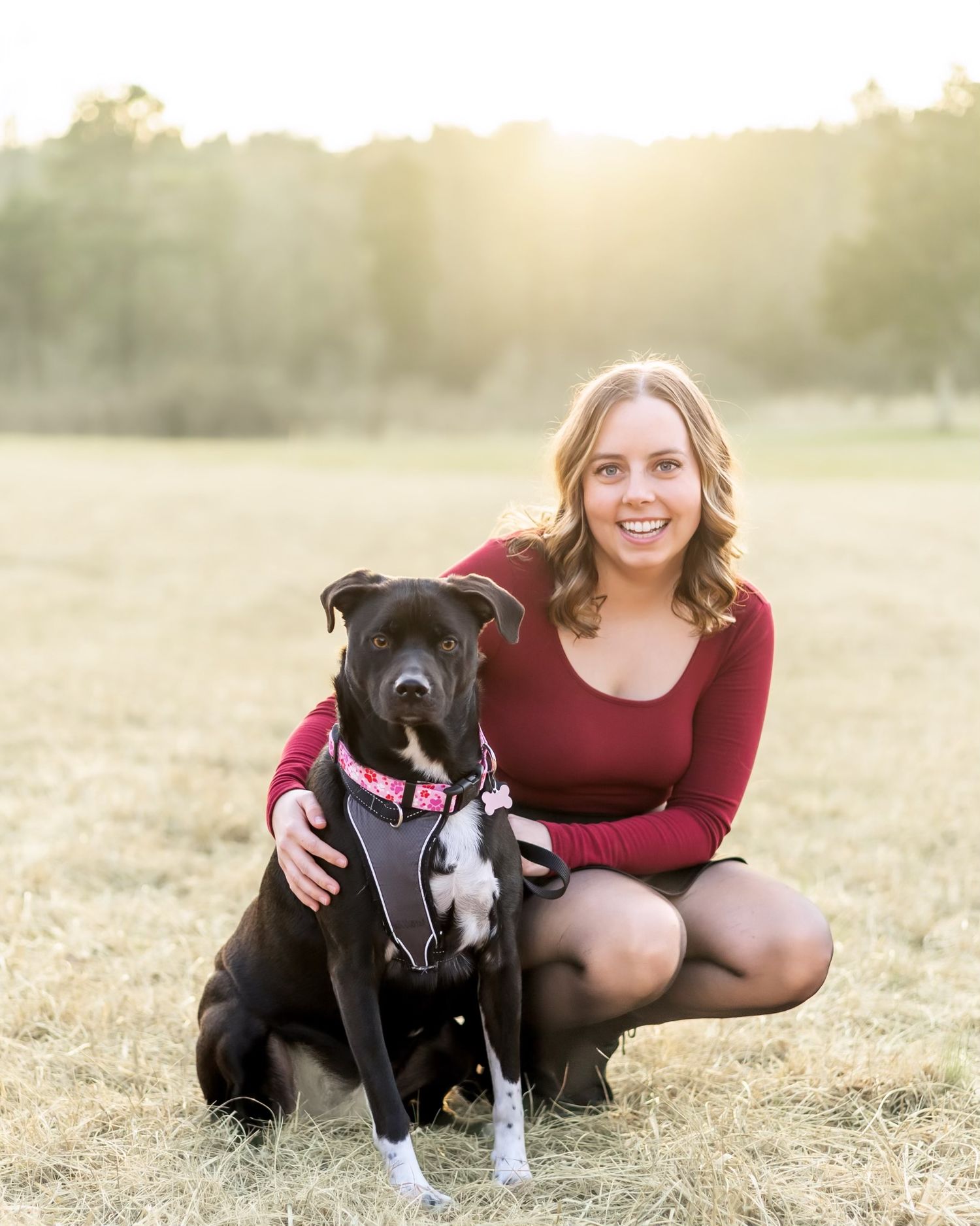 Girl smiling with rescued pup