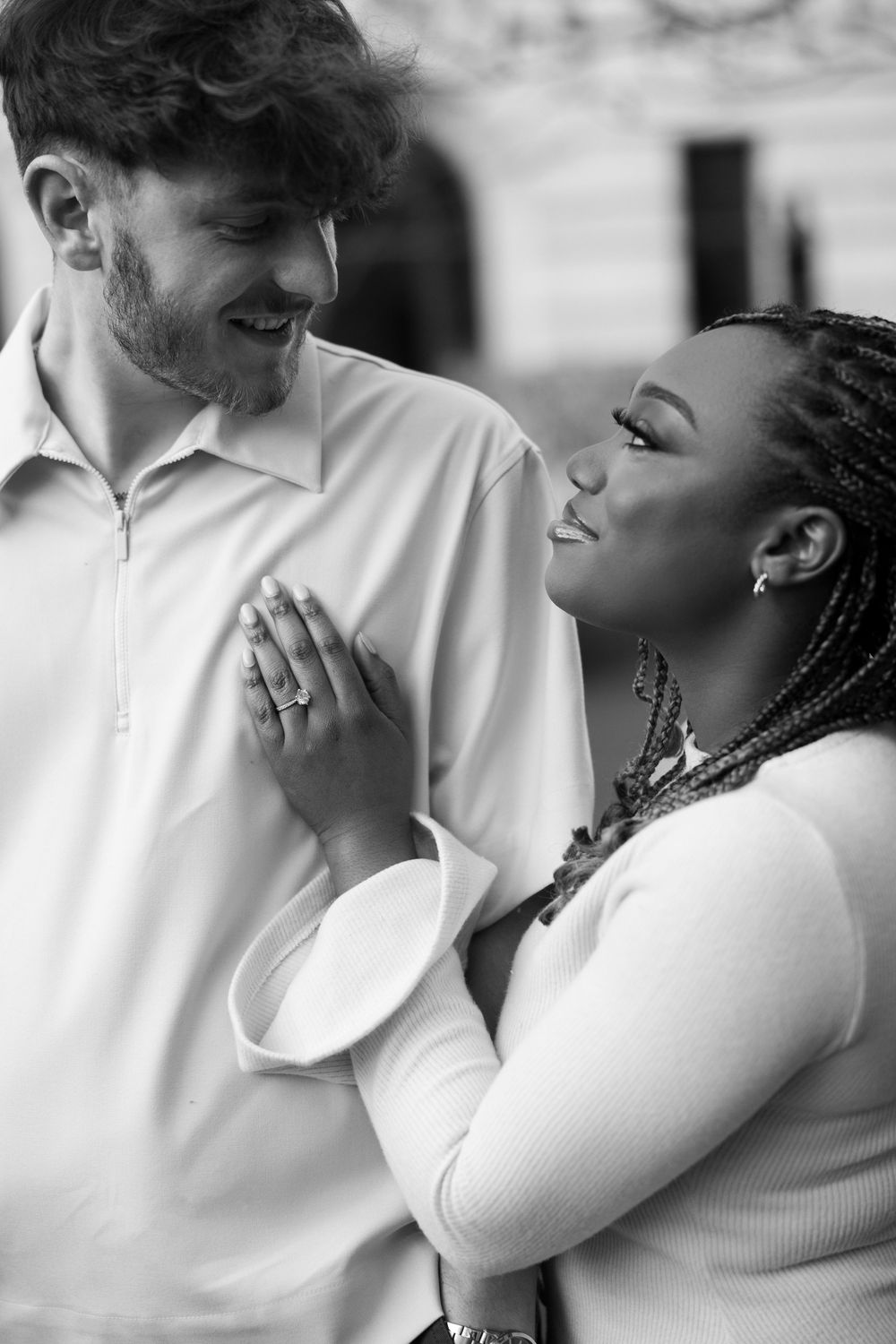 A romantic black and white photo series showing a couple embracing in intimate close-up shots.
