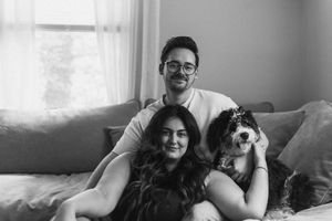 A series of black and white candid photos showing people relaxing at home with their pets.