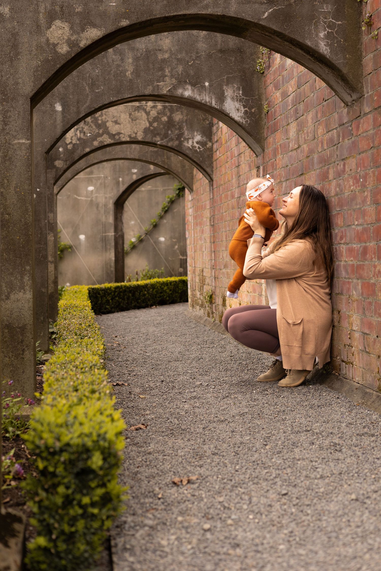 Motherhood session at Mona Vale Christchurch, mum holding her 3 month old baby