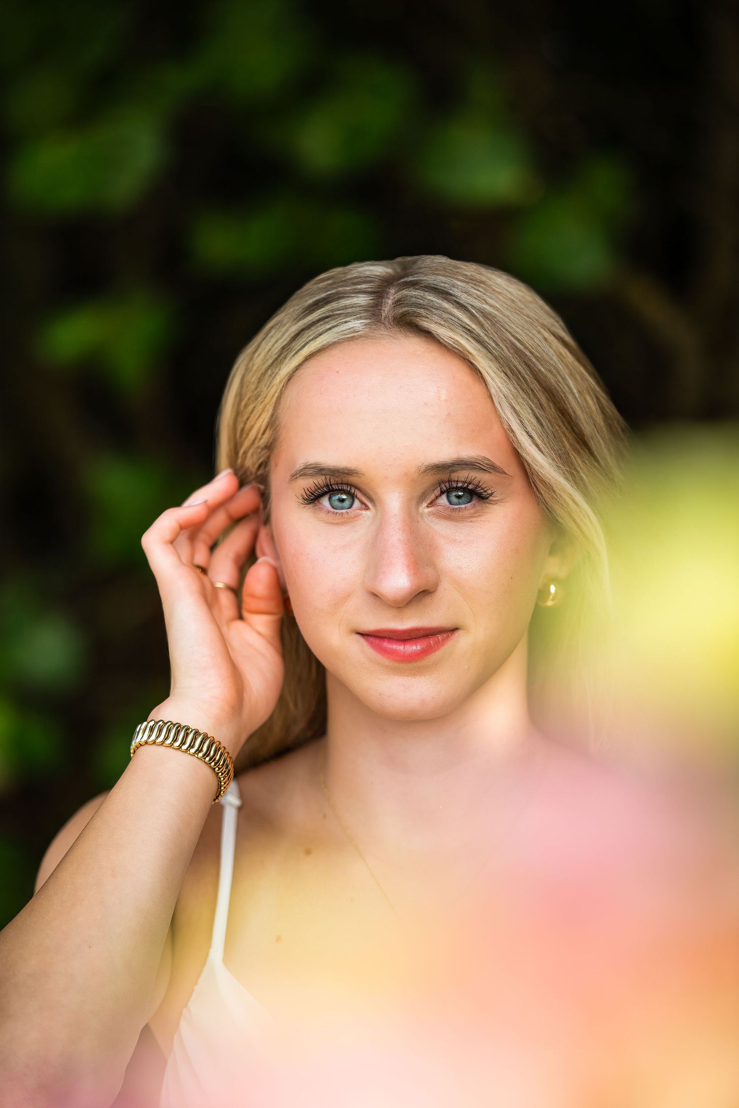 Amelia, senior and high school graduate client, posing for individual portraits in DuBois Park, Jupiter, Florida of Palm Beach County