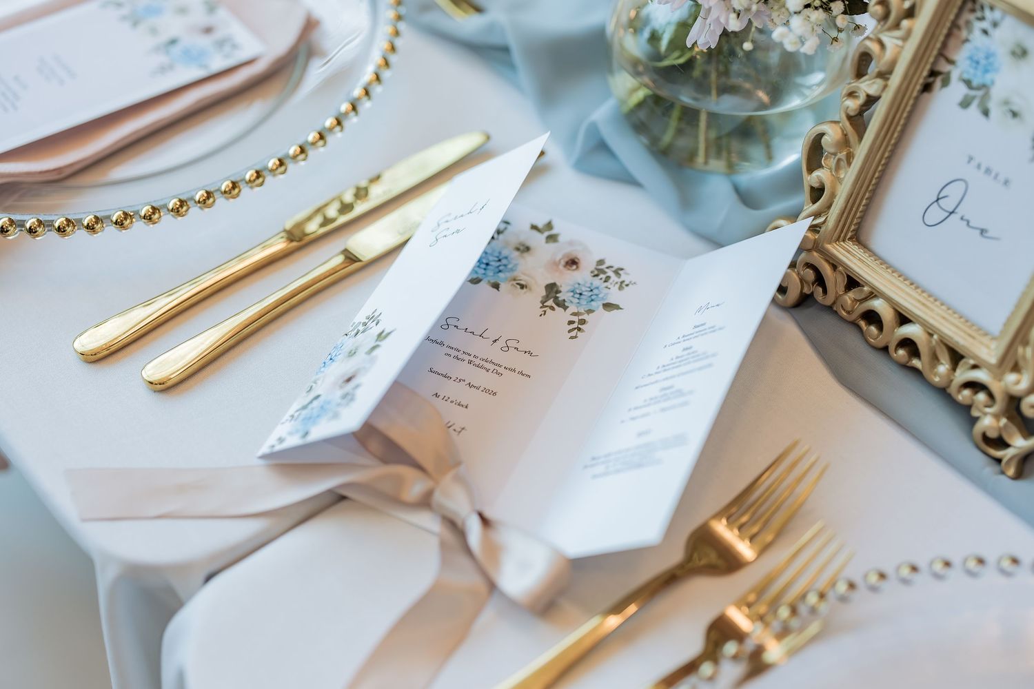 Elegant menus and table settings captured by a documentary wedding photographer at Charlotte House.