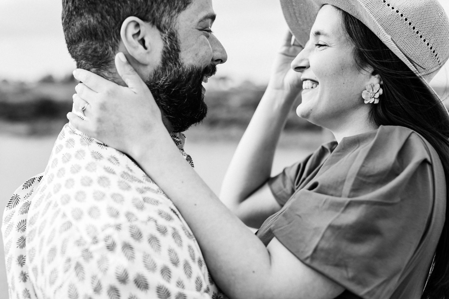 Black and white close up portrait of smiling couple during engagement session in Setúbal Portugal