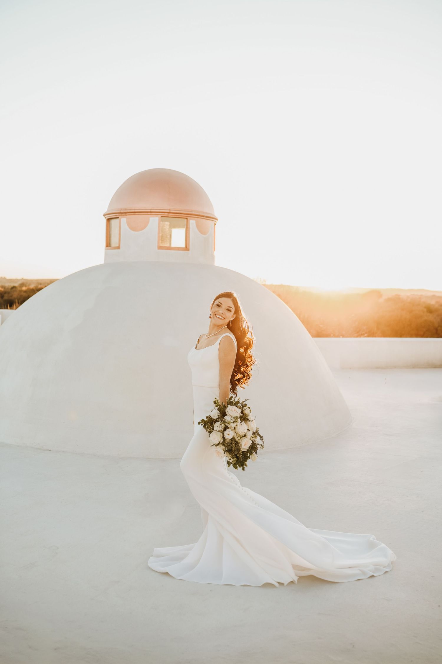 Bride laughing naturally during bridal session at Stoney Ridge Villa in Azle Texas