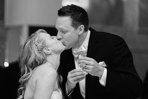 Romantic black and white photo sequence showing a couple sharing sweet kiss moments during their wedding celebration.