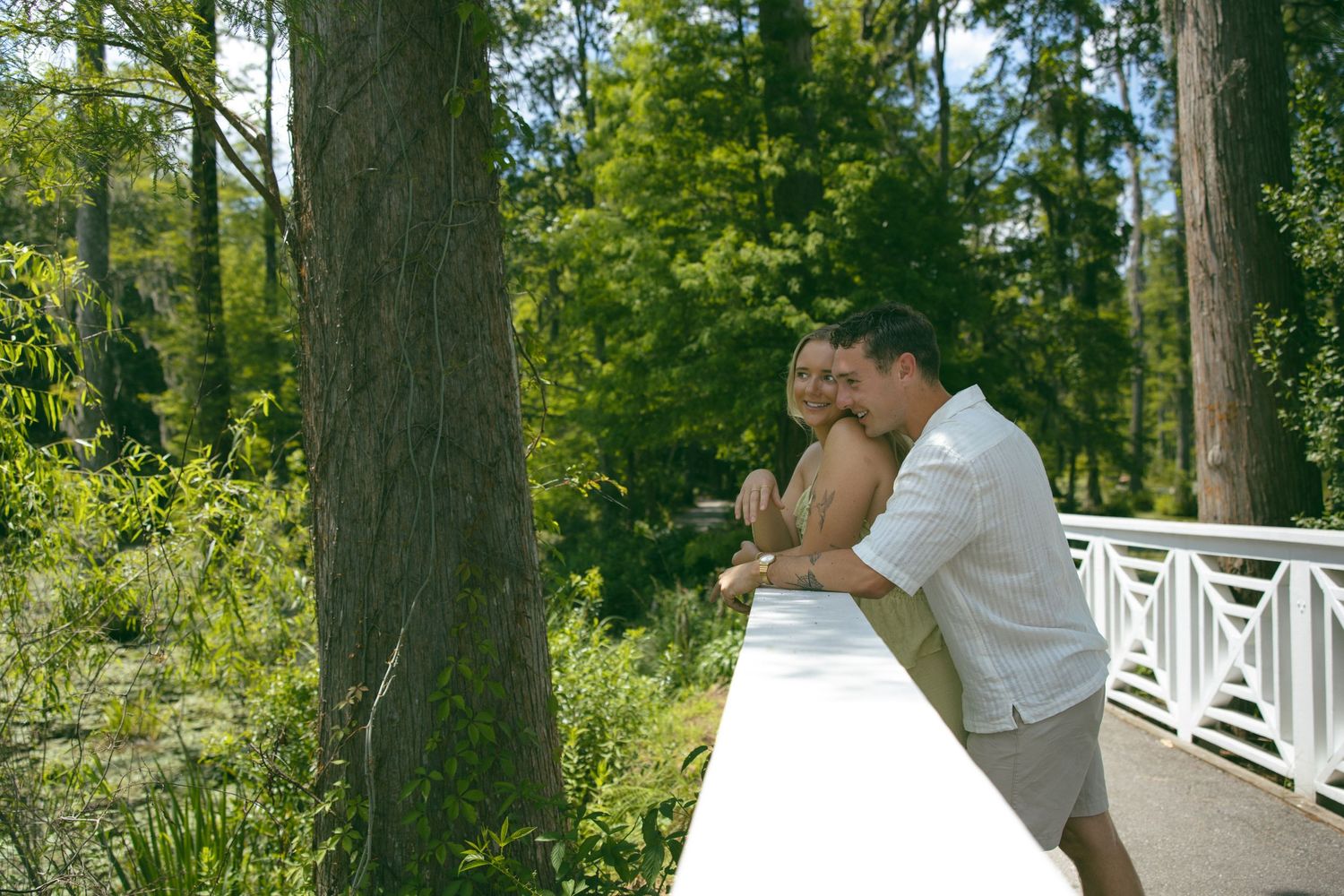 nc sc cypress gardens couples photoshoot engagement session boats lake romantic moody bridge cuddle