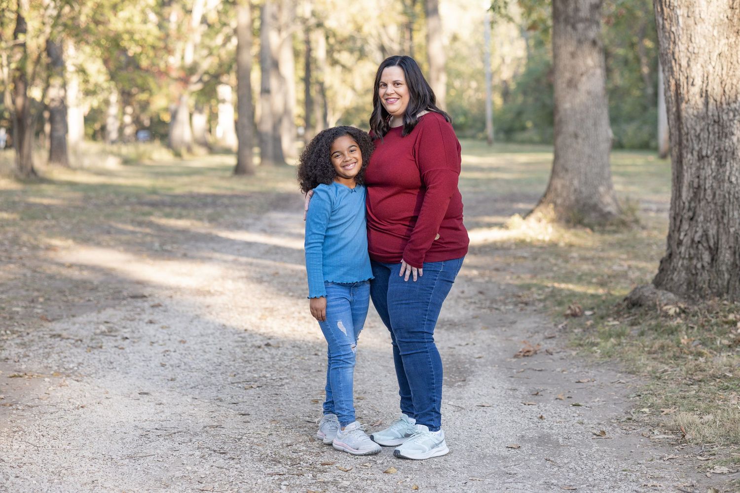 Springfield, IL family photographer captures a mom smiling with her daughter during a photo session in Central, IL