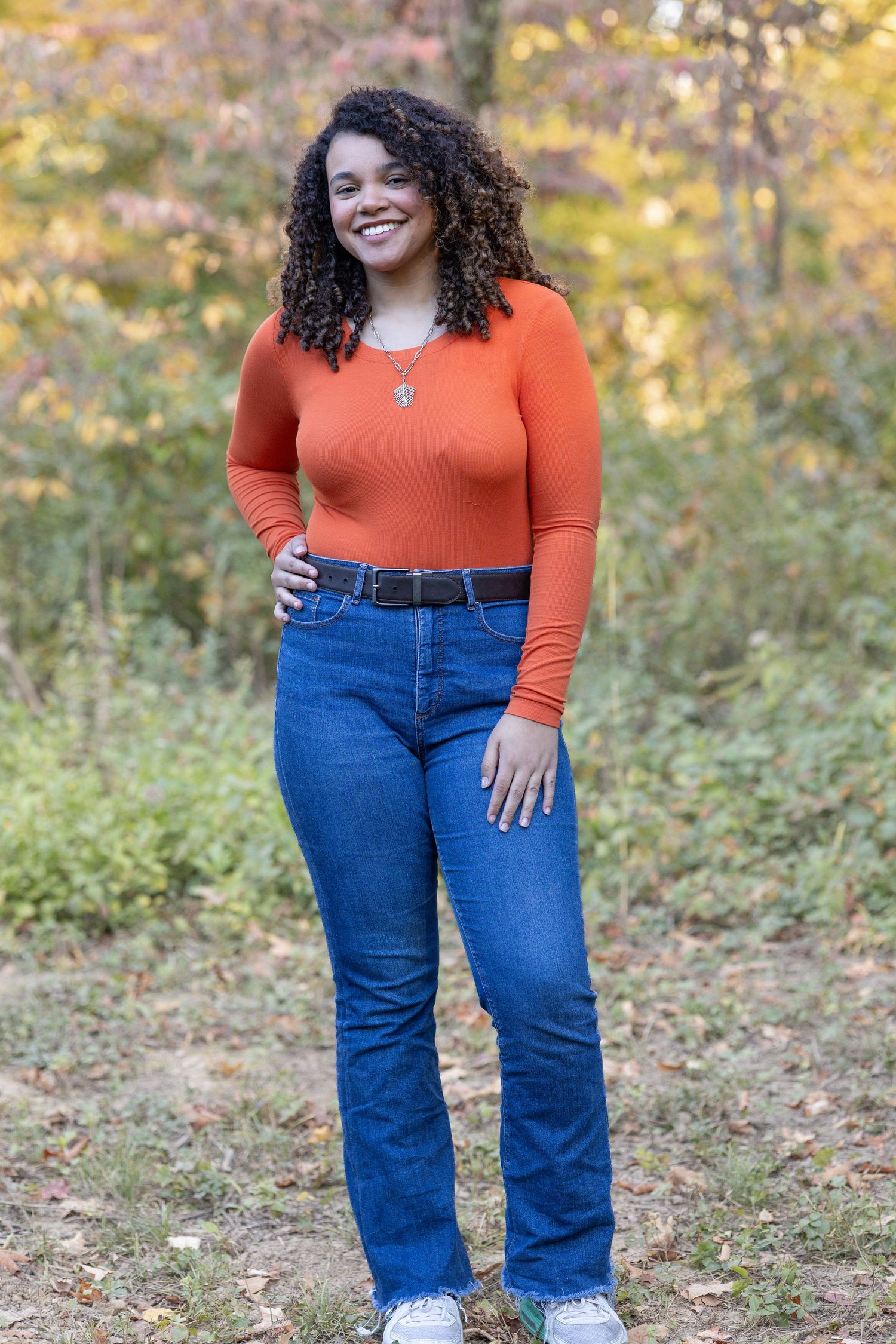 Springfield, IL family photographer captures a teen smiling during a photo session in Central, IL
