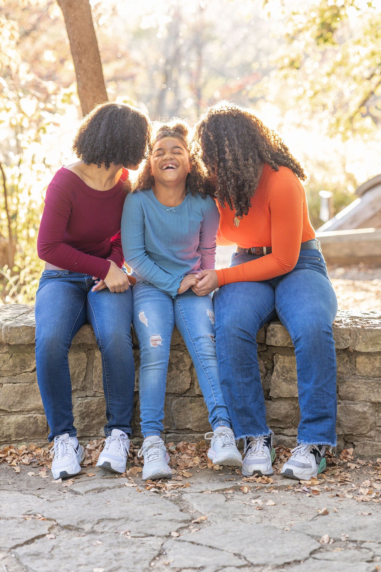 Springfield, IL family photographer captures three siblings together during a photo session in Central, IL