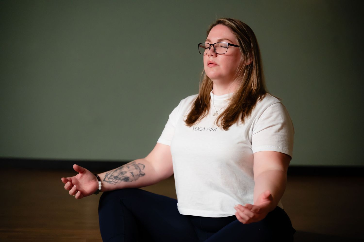 Figure in white shirt against dark background moves through a series of dynamic gestures showing conversational body language.