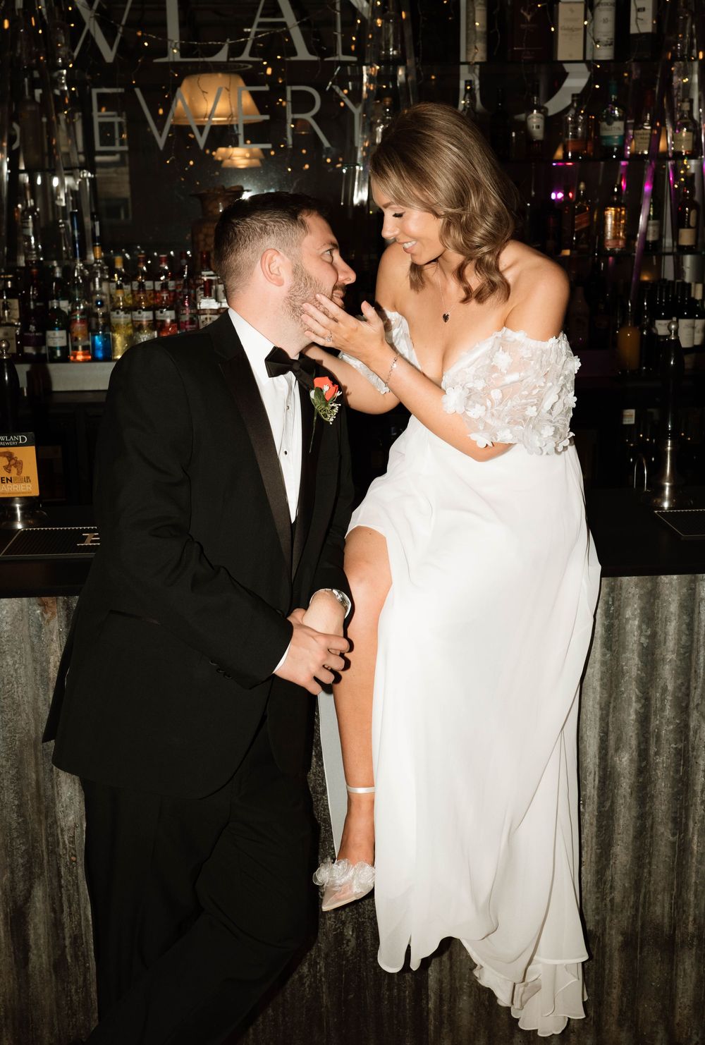 Stylish reception flash portrait at Holmes Mill, captured with editorial composition and cinematic direct flash by Manchester photographer